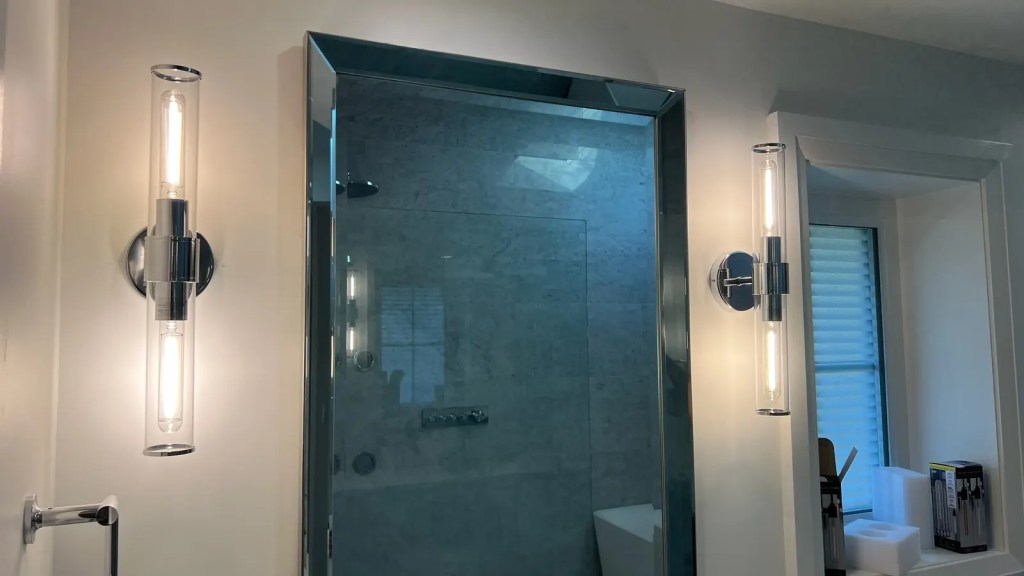 Bathroom vertical sconces shower