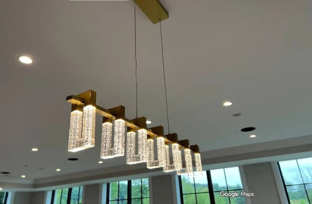 Gold linear pendant dining
