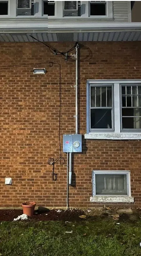 Service mast meter brick exterior